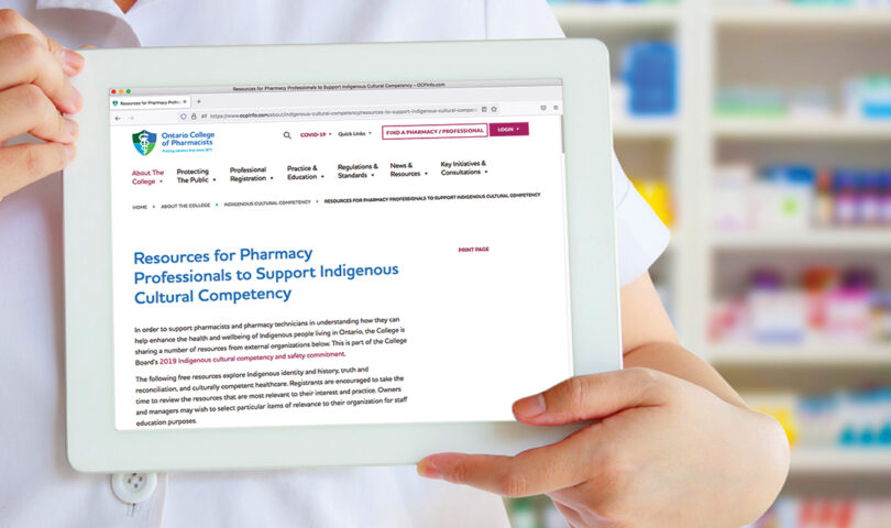 Pharmacist with Indigenous Resources page on tablet screen