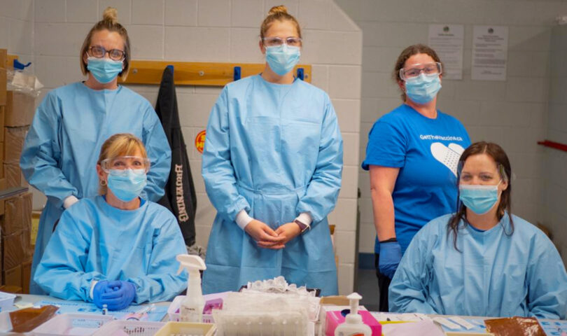 Photos of Pharmacy Technicians wearing PPE