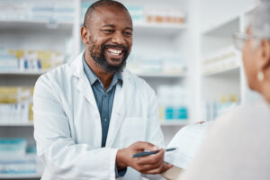 pharmacist helping senior